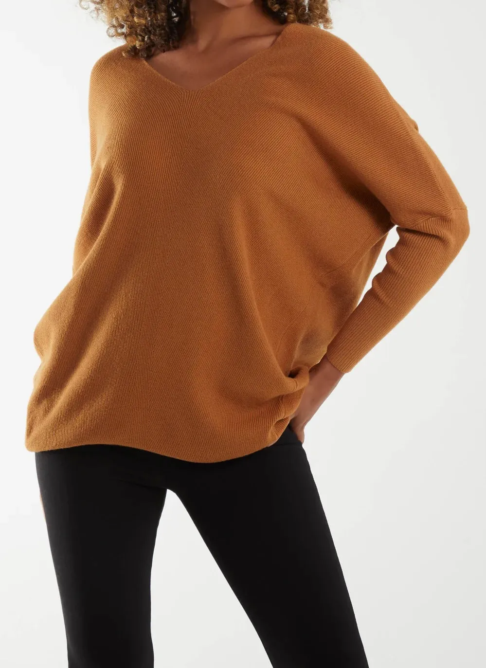 Plain V-Neck Fine Knit Long Line Jumper With A Leopard Bow Back Detail (3 Colours)