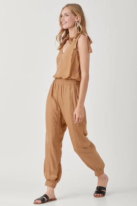 V NECK SMOCKED WAIST JOGGER JUMPSUIT